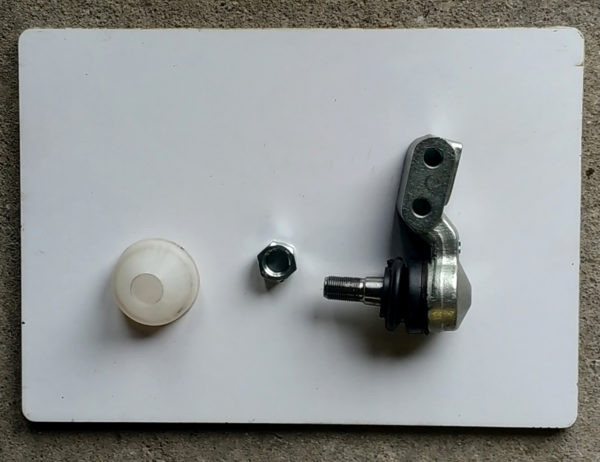 rotule suspension basse taxis anglais avec ecrou et cache blanc sur plaque blanche