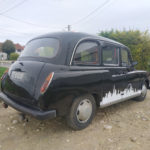 taxi anglais fairway avec frise de londres en autocollant sur le cote