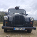 vue devant taxi anglais noir fairway avec immatriculation francaise